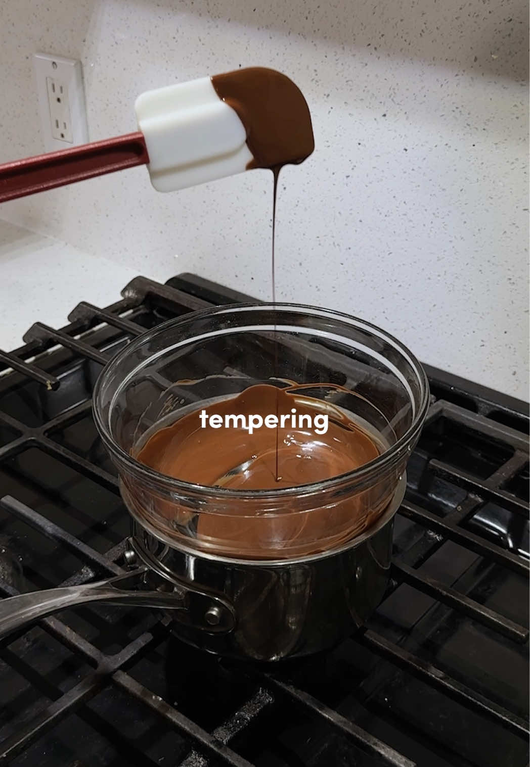 Baking Basics Ep. 12: Chocolate Tempering 🍫 Did you know? Tempered chocolate is set firm, shiny, and snaps when broken into. While untempered chocolate can look dull, streaky, and 的 TikTok 影片封面